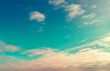 Obraz premium Colorful cloudy sky at sunset. Gradient color. Sky texture. Abstract natural background