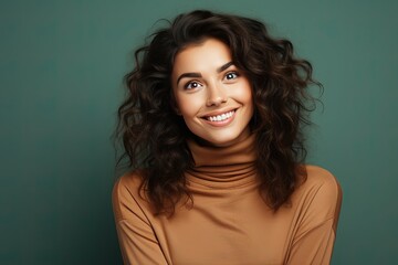 Fototapeta premium Portrait of attractive girl isolated on blue background.