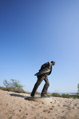 Jean Paul Sartre statue on dunes