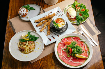 set of Italian food on the table. a variety of Italian food.