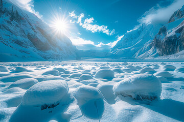 Snowy glacier valley with sun shining above the peaks and blue sky - Powered by Adobe