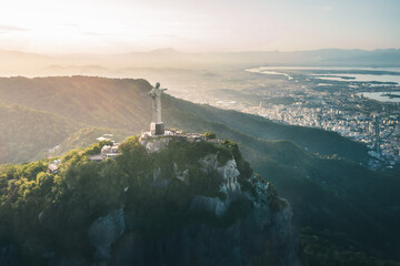 Aerial view of Christ the Redeemer Statue on top of Corcovado Mountain and downtown Rio - Rio de Janeiro, Brazil - obrazy, fototapety, plakaty