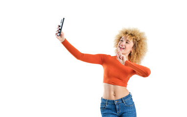 young girl with blonde afro hair taking a selfie with her smart phone on white background