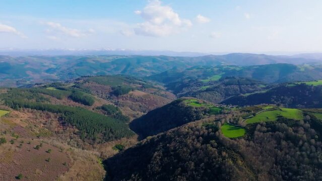 Aerial shot of the mountainous landscape of Galicia in the town of Fonsagrada in Lugo, Spain.