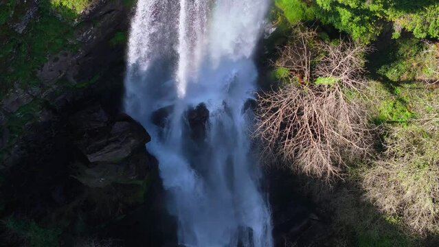 Drone shot above Seimeira de Vilagocende cascades near Fonsagrada, Lugo, Galicia, Spain.