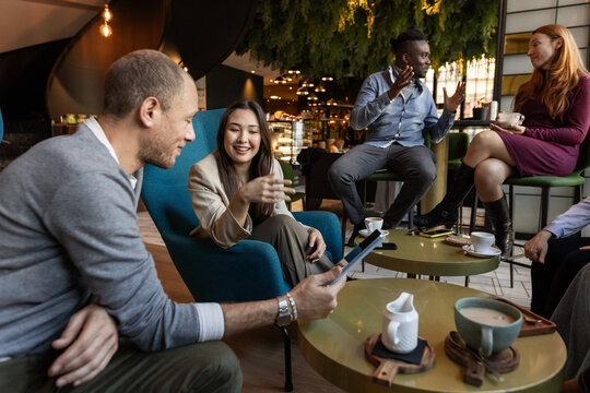 Asian girl with her friends in a restaurant