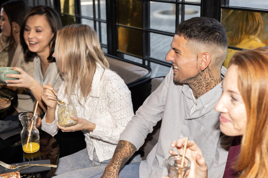 group of friends in a vegan restaurant