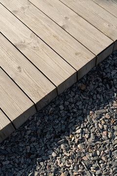 Sunlight falls at decking board terrace outdoors