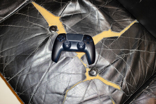 Game controller, wires and game computer / screen  - Powered by Adobe