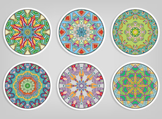 Decorative round ornaments set, isolated elements. Colorful mandala, stylized flower. Abstract geometric doodle patterns for plate decoration, fabric print,  business or greeting card design