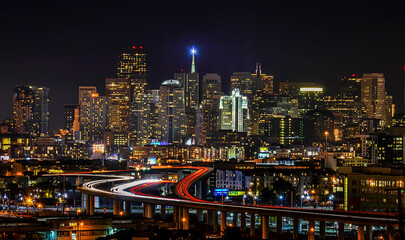 City skyline and freeway at night