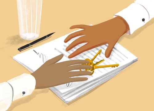 hands with the key and contract
