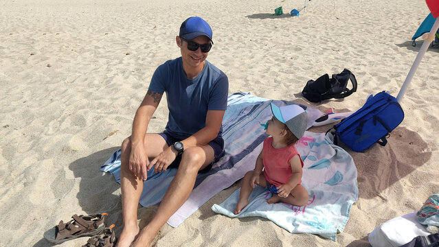 Dad and son at the beach