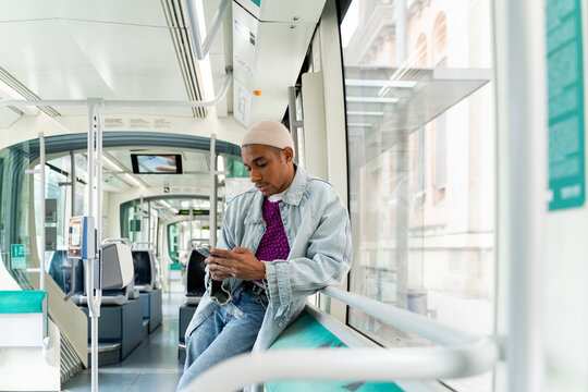 Man With Phone At Public Transport
