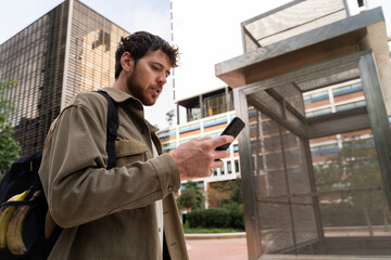 Business man use phone in the city