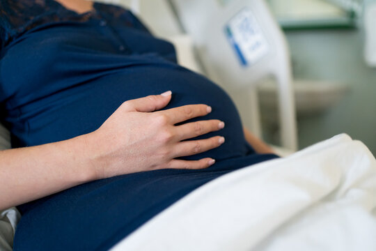 Woman at the hospital during pregnancy - Powered by Adobe
