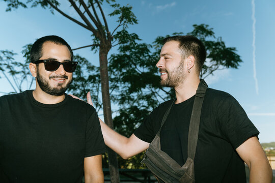 Two Men Sharing a Friendly Hello
