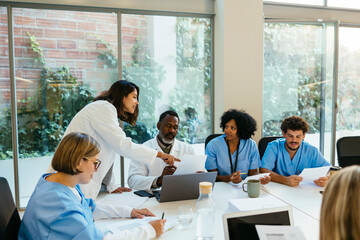 Healthcare workers having a meeting at hospital