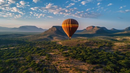 Obraz premium hot air balloon soaring high in the endless blue sky!