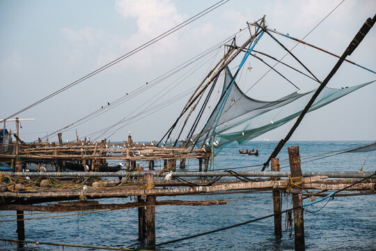 A view of fishing nets and ocean.