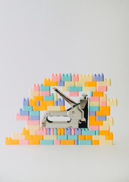 staple gun walled in bricks
