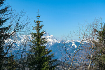 Scenic view of snowcapped mountain peaks of Julian Alps seen from Dreilaendereck, Karawanks, Carinthia, Austria. Hiking in remote alpine landscape in early springtime in Austrian Alps. Wanderlust