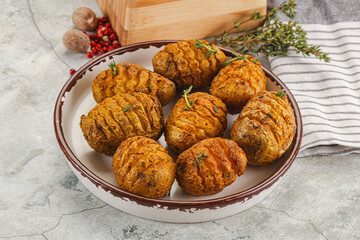 Baked baby potato with thyme
