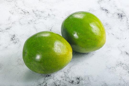 Two ripe green exotic avocado fruit