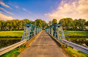 Naklejka premium The Laarbrug bridge crossing the Wilhelminakanaal canal near the village of Aarle-Rixtel, Noord-Brabant, The Netherlands.