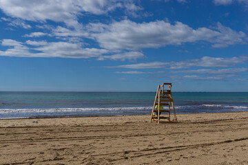 Beach lifeguard on a calm spring morning.