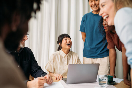Coworkers having fun in office