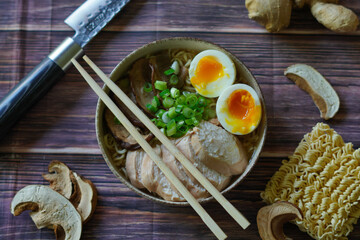 Ramen bowl with chicken and runny eggs
