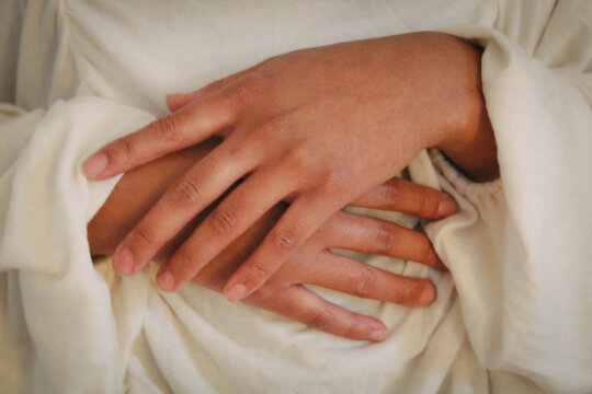 Closeup Hands with White Sweater