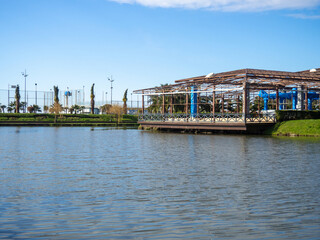 Construction of a restaurant on the shore of the city lake. Reconstruction of the local restaurant building. Famous place in Batumi.