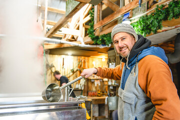 sugar shack, a maple farmer wearing a traditional clothe working doing sugar sirop