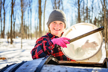 sugar shack, child having fun at mepla shack forest collect maple water - 777683705