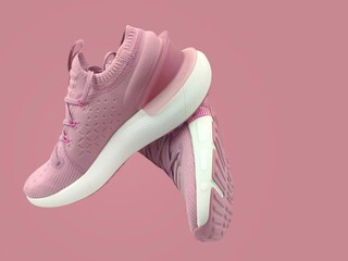 Photo of female sport sneakers, isolated on pink background with space for text. 