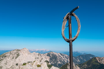 Mountain summit of Vertatscha (Vrtaca) with scenic view of majestic Hochstuhl (Stol) in untamed...