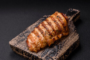 Delicious fresh grilled chicken fillet with spices and herbs