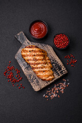 Delicious fresh grilled chicken fillet with spices and herbs