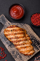Delicious fresh grilled chicken fillet with spices and herbs