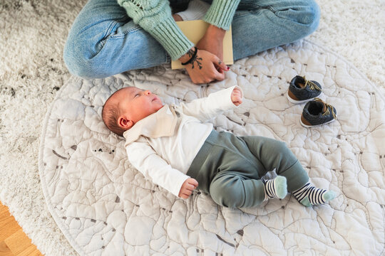 Relaxed baby laying on the floor