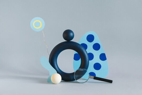 Different colored objects together on paper background