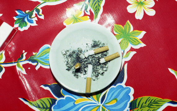 Ashtray on Patterned Tablecloth