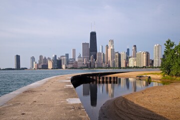 Panorama view of Chicago skylines reflection from beach 