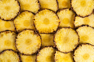 Fresh ripe sliced pineapple closeup - 777702904