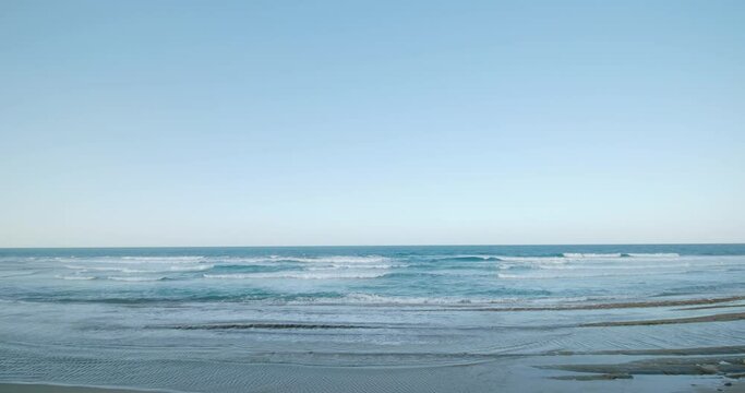 Reef break and wavy ocean. Breathtaking wide point of view. 