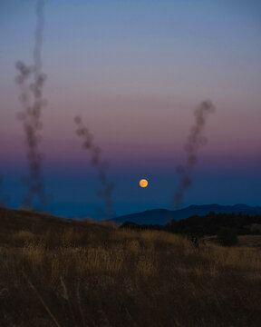 Moon rising above horizon in Redwood City, California