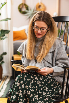 Woman reading at home
