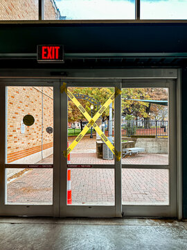 Caution tape on automatic door